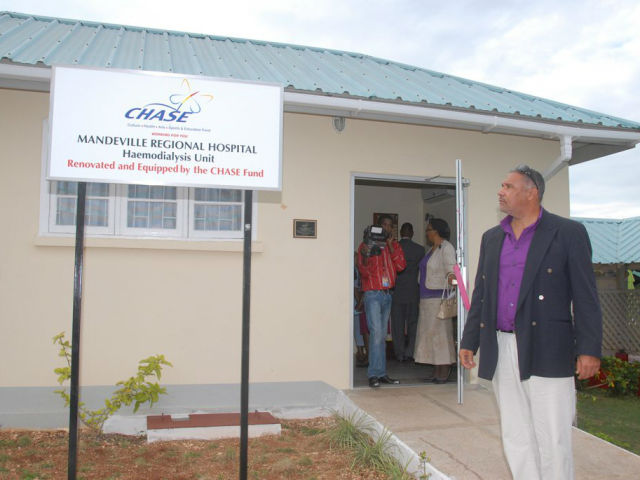 CHASE Director, Saleem Lazarus stands outside the Dialysis Unit at the Mandeville Regional Hospital. A $24 milion contribution by CHASE facilitated the establishment of the Public Dialysis Unit at the Mandeville Regional Hospital three years ago. Prior to this, some 83.6% of the patients who attended the institution’s renal clinic died without receiving dialysis. Chronic renal failure is an increasingly significant national health issue, as approximately 10% of the growing number of diabetics ends up with this condition. The Unit accommodates 32 patients and serves the parishes of Manchester, St. Elizabeth, Clarendon and St. Ann. A second phase of development is proposed, to cater to an additional 10 to 15 patients.