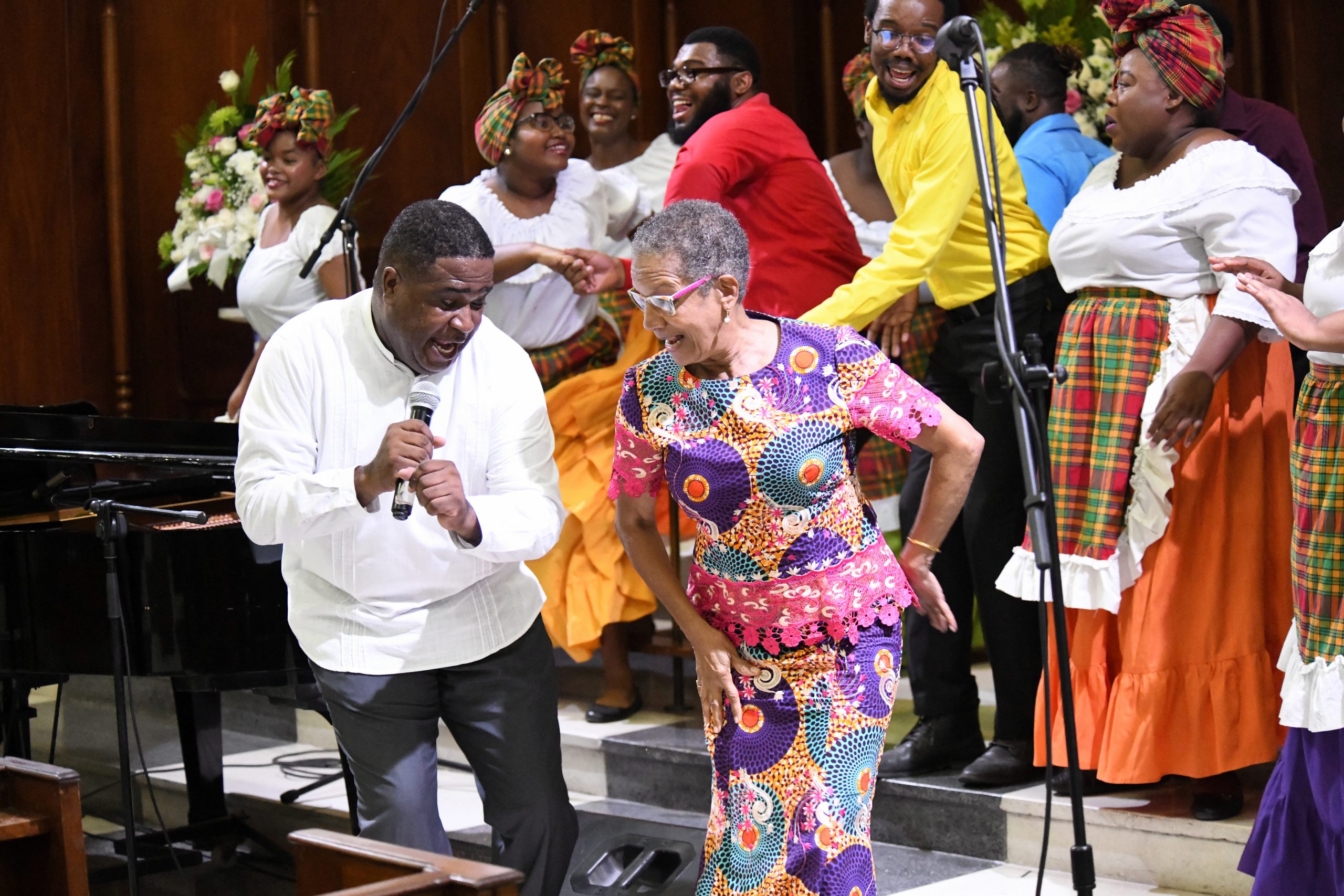 Master of ceremonies, Fae Ellington, does Gerreh with Hugh Douse of the Nexus Performing Arts Company during the group’s performance of “Miss Lou Medley”.