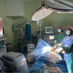 Doctors using a Laparoscopic machine which was donated by the CHASE Fund to the Bustamante Hospital for Children.