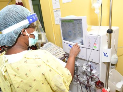 Nurse Kimar Bartley monitors a dialysis unit.
